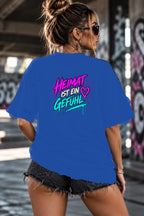 Neon Vibe Damen Oversized T-Shirt – Heimat ist ein Gefühl – DTF Backprint in Blau, Größe 5XL