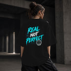 Neon Vibe Damen Oversized T-Shirt – Real Not Perfect – DTF Backprint in Schwarz, Größe 5XL