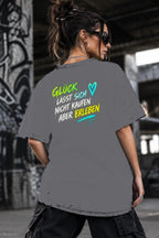 Neon Vibe Damen Oversized T-Shirt – Glück lässt sich nicht kaufen aber erleben – DTF Backprint in Grau, Größe 5XL